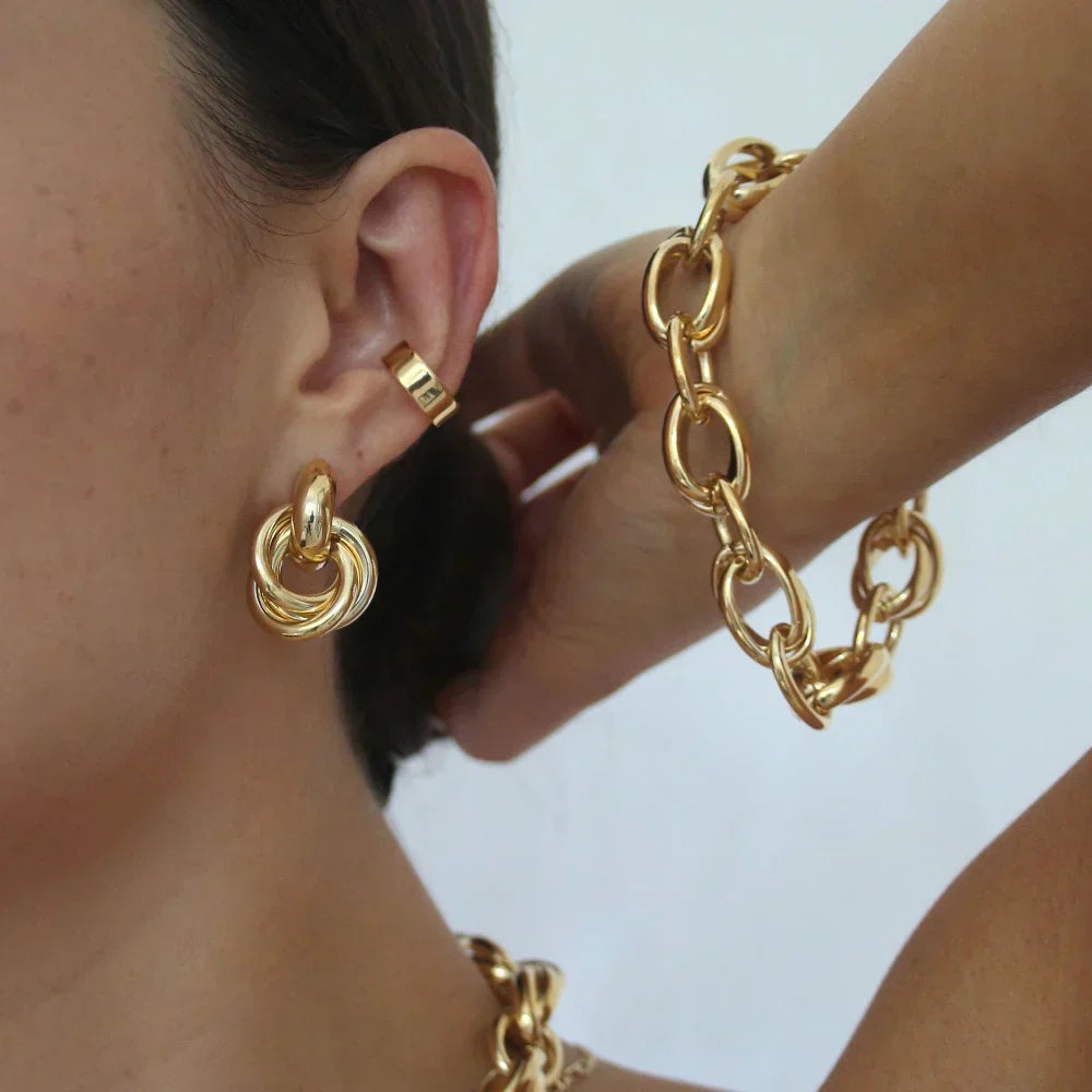 Statement Interlocking Fülbevaló | Arany